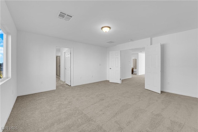 6142 Kelson Creek Ct, Las Vegas, NV 89118 - carpeted empty room with baseboards, visible vents, and a healthy amount of sunlight