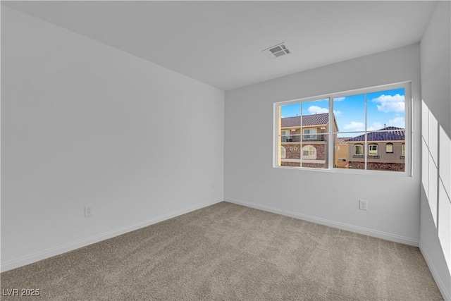 6142 Kelson Creek Ct, Las Vegas, NV 89118 - spare room featuring carpet flooring, baseboards, and visible vents