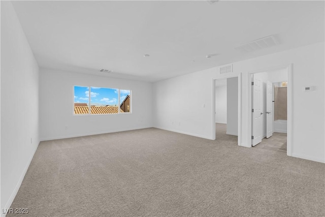 6142 Kelson Creek Ct, Las Vegas, NV 89118 - empty room with baseboards, visible vents, and light carpet