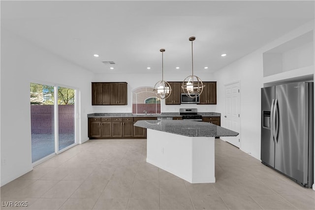 6142 Kelson Creek Ct, Las Vegas, NV 89118 - kitchen with visible vents, dark brown cabinetry, stone countertops, recessed lighting, and appliances with stainless steel finishes