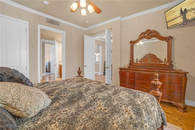 20 Via Mantova Unit 306, Henderson, NV 89011 - bedroom featuring light wood-style flooring, crown molding, baseboards, and ceiling fan