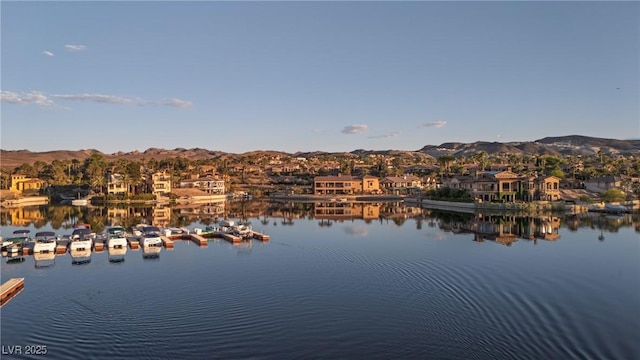 20 Via Mantova Unit 306, Henderson, NV 89011 - water view with a mountainous background and a boat dock