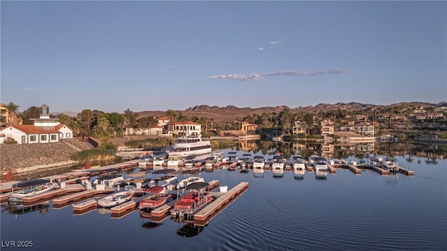 20 Via Mantova Unit 306, Henderson, NV 89011 - water view with a floating dock, mountains, and numerous boat docks