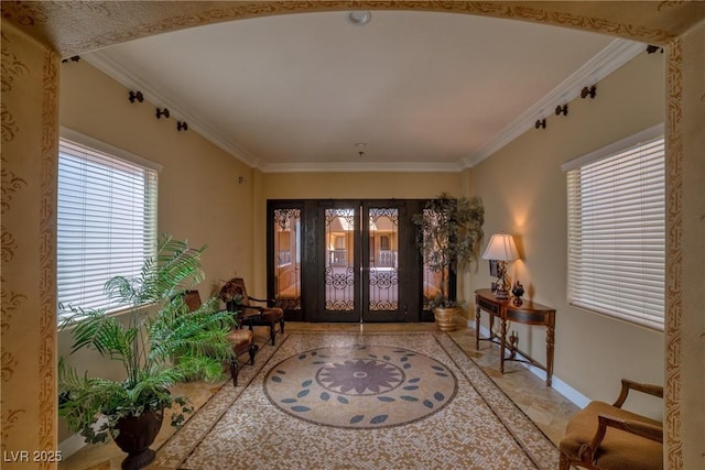 20 Via Mantova Unit 306, Henderson, NV 89011 - foyer entrance with french doors, crown molding, and baseboards