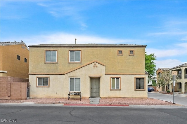 6928 Smiling Cloud Ave, Henderson, NV 89011 - view of front facade featuring fence and stucco siding