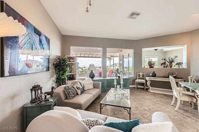 2110 King Mesa Dr, Henderson, NV 89012 - living area featuring baseboards and track lighting