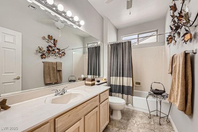 2110 King Mesa Dr, Henderson, NV 89012 - full bathroom featuring a ceiling fan, toilet, vanity, shower / tub combo with curtain, and tile patterned floors