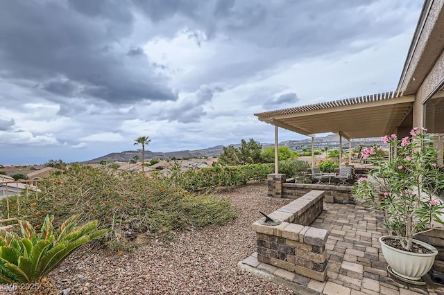 2110 King Mesa Dr, Henderson, NV 89012 - view of yard with a patio area and a mountain view