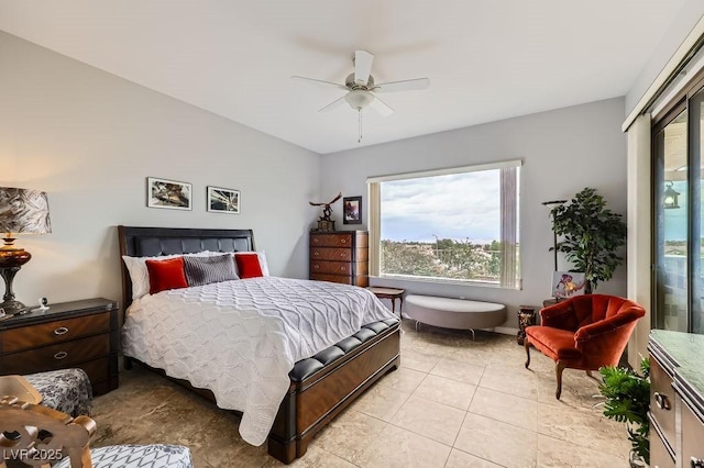 2110 King Mesa Dr, Henderson, NV 89012 - bedroom with light tile patterned floors and a ceiling fan