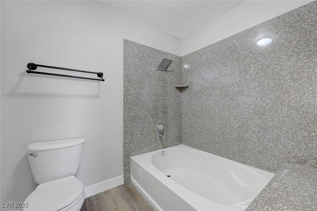 2451 N Rainbow Blvd Unit 2144, Las Vegas, NV 89108 - bathroom with toilet, wood finished floors, shower / washtub combination, and baseboards