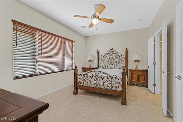6001 Falconer Ave, Las Vegas, NV 89122 - bedroom featuring baseboards, a ceiling fan, and light tile patterned floors