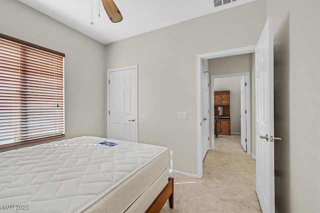6001 Falconer Ave, Las Vegas, NV 89122 - bedroom featuring baseboards and ceiling fan