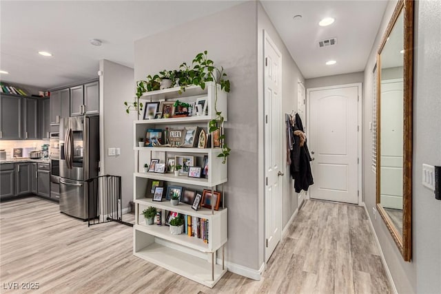 39 Castleton Tower Ct, Henderson, NV 89011 - corridor with recessed lighting, baseboards, visible vents, and light wood-style flooring
