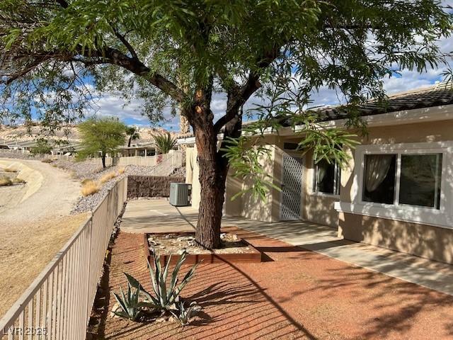 3349 Partridge Run St, Laughlin, NV 89029 - rear view of property featuring a patio area and central AC unit