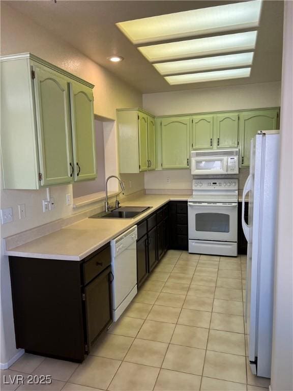 3349 Partridge Run St, Laughlin, NV 89029 - kitchen featuring white appliances, green cabinetry, a sink, light countertops, and recessed lighting