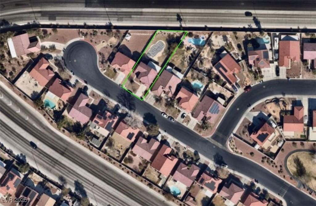 6726 Montezuma Castle Ln, North Las Vegas, NV 89084 - aerial overview of property's location with property parcel outlined