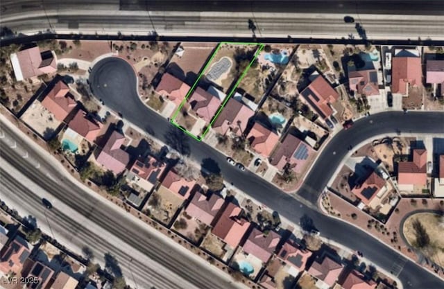 6726 Montezuma Castle Ln, North Las Vegas, NV 89084 - aerial overview of property's location with property parcel outlined