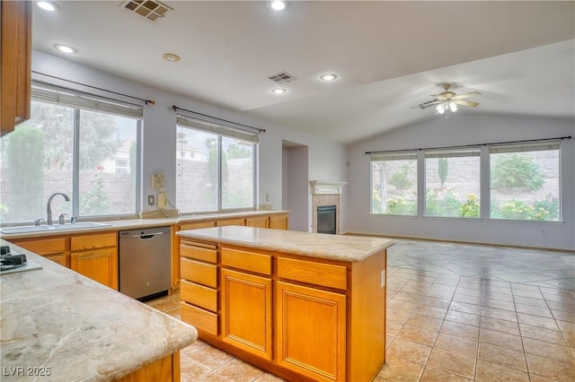 2383 Rainswept Ave, Henderson, NV 89052 - kitchen featuring a sink, visible vents, open floor plan, and dishwasher
