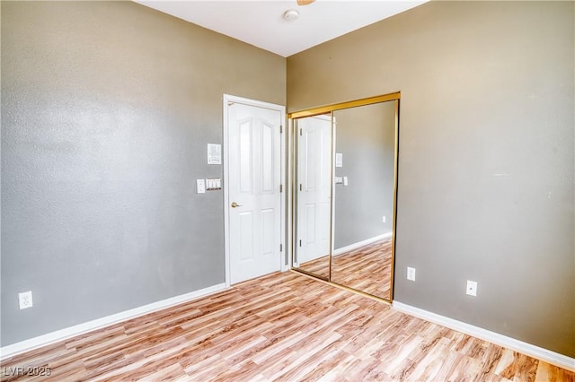 2383 Rainswept Ave, Henderson, NV 89052 - empty room featuring light wood-style floors and baseboards