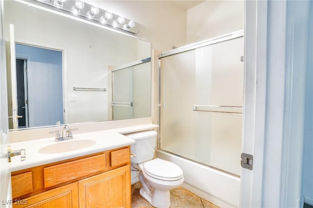 2383 Rainswept Ave, Henderson, NV 89052 - full bath featuring vanity, tile patterned floors, combined bath / shower with glass door, and toilet