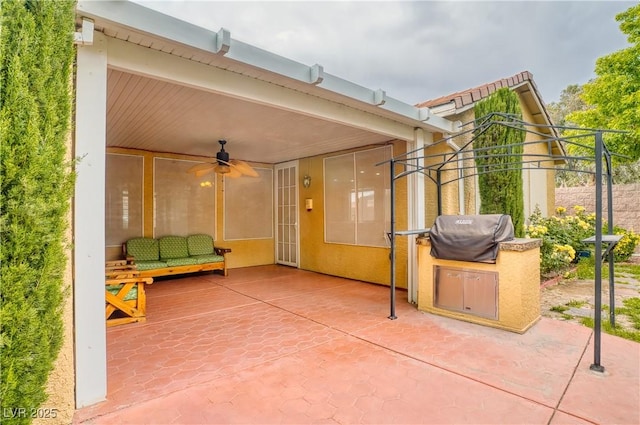 2383 Rainswept Ave, Henderson, NV 89052 - view of patio with an outdoor kitchen and a ceiling fan