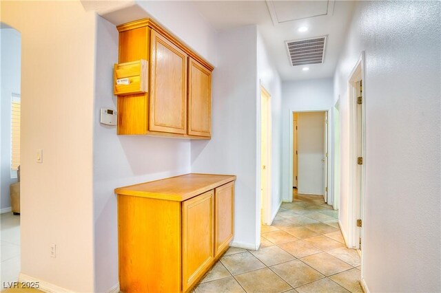 2383 Rainswept Ave, Henderson, NV 89052 - hallway with visible vents, arched walkways, baseboards, recessed lighting, and light tile patterned flooring