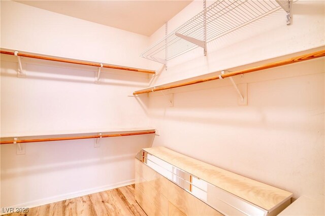 2383 Rainswept Ave, Henderson, NV 89052 - spacious closet with light wood-style flooring