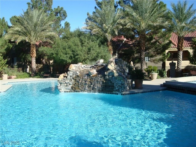 community pool with fence