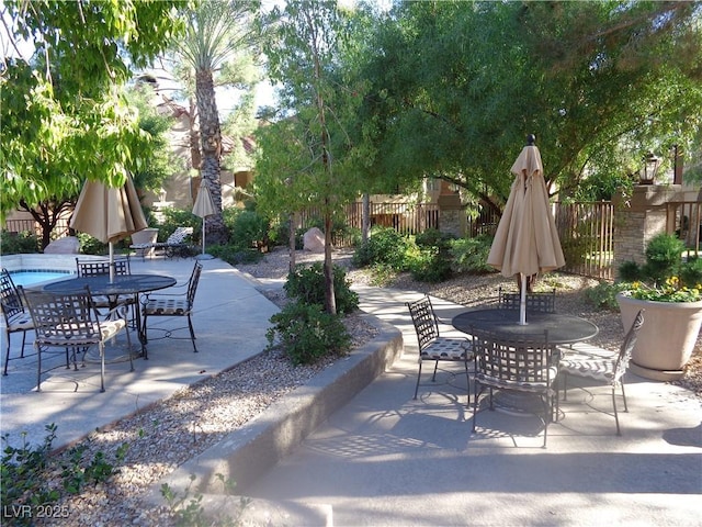 view of patio / terrace with fence and outdoor dining area