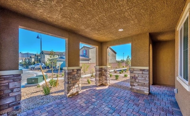 view of patio / terrace with a residential view