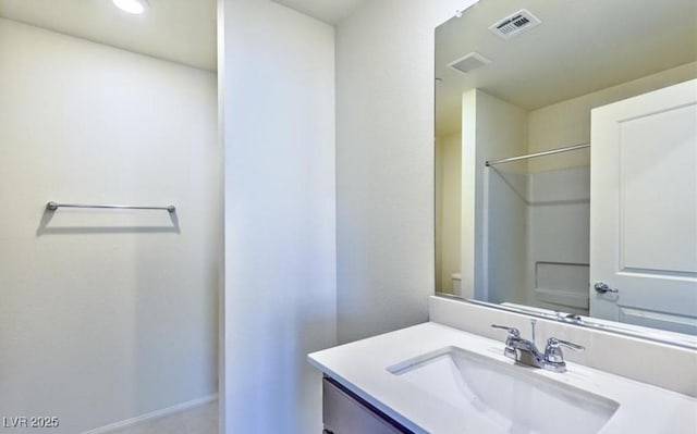 full bathroom with baseboards, recessed lighting, vanity, and visible vents