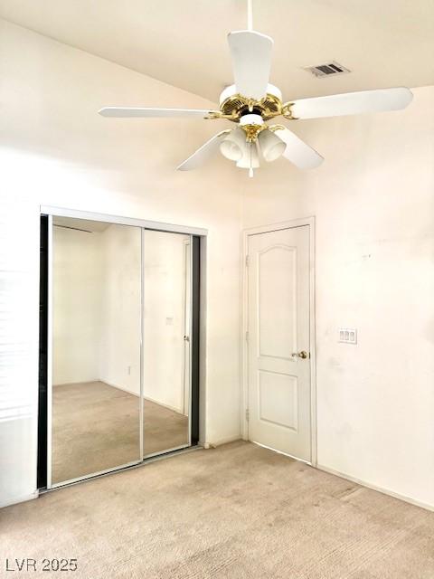 1812 Jack Rabbit Way, Las Vegas, NV 89128 - unfurnished bedroom featuring light colored carpet, a closet, and a ceiling fan