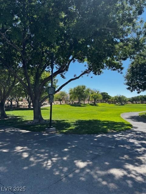1812 Jack Rabbit Way, Las Vegas, NV 89128 - view of home's community with a lawn