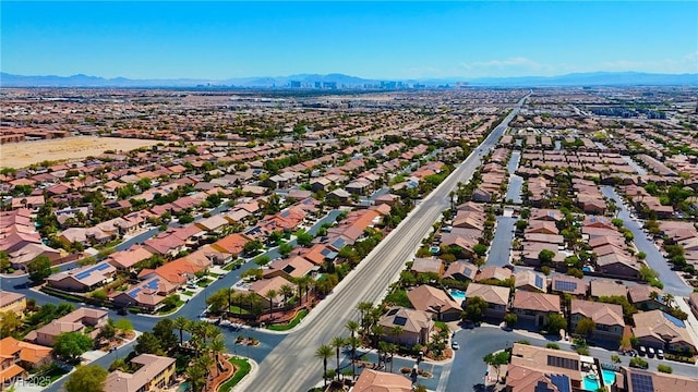 aerial view featuring a mountain view and a residential view