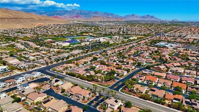 drone / aerial view with a mountain view and a residential view