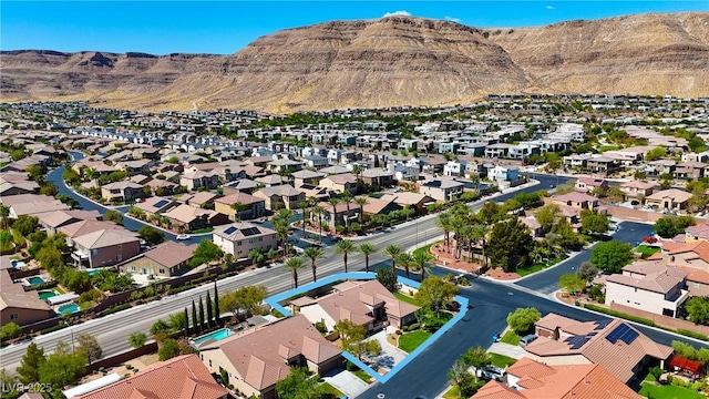 bird's eye view featuring a mountain view and a residential view