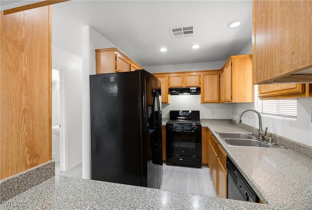 4076 Rocky Beach Dr, Las Vegas, NV 89115 - kitchen featuring a sink, black appliances, visible vents, under cabinet range hood, and light countertops