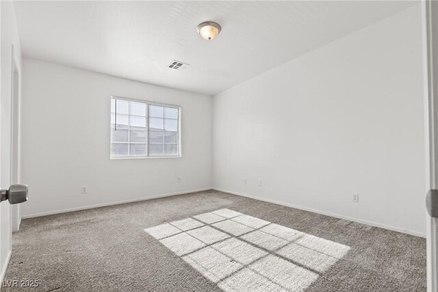 4076 Rocky Beach Dr, Las Vegas, NV 89115 - unfurnished room featuring baseboards, carpet flooring, and visible vents