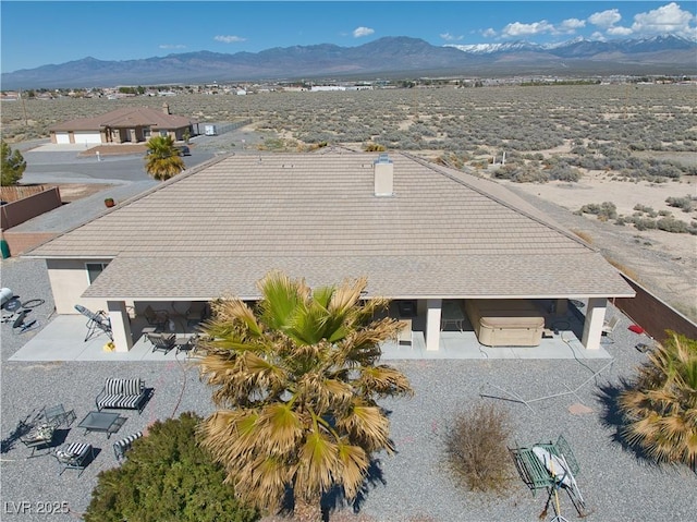 aerial view with view of desert and a mountain view