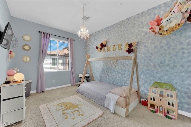 bedroom featuring carpet, wallpapered walls, a notable chandelier, visible vents, and baseboards
