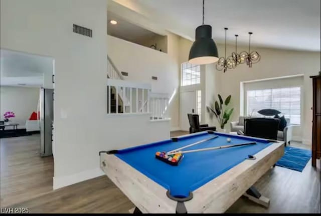 6736 Quinella Dr, Las Vegas, NV 89103 - playroom with baseboards, an inviting chandelier, visible vents, wood finished floors, and billiards