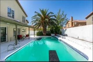 6736 Quinella Dr, Las Vegas, NV 89103 - view of swimming pool featuring a patio area, a fenced in pool, and a fenced backyard