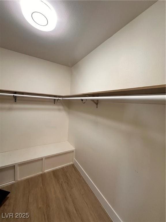 6460 Linda Ln, Las Vegas, NV 89103 - spacious closet with dark wood finished floors