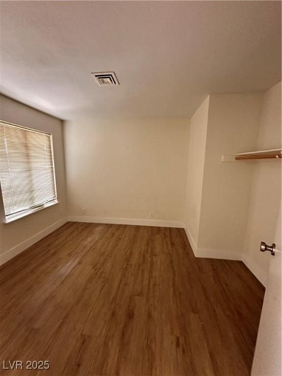 6460 Linda Ln, Las Vegas, NV 89103 - empty room featuring baseboards, visible vents, and wood finished floors