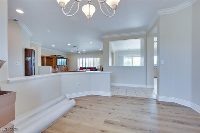 1613 Williamsport St, Henderson, NV 89052 - kitchen with a chandelier, wood finished floors, ornamental molding, recessed lighting, and baseboards