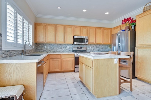 1613 Williamsport St, Henderson, NV 89052 - kitchen with appliances with stainless steel finishes, light brown cabinets, light tile patterned floors, and ornamental molding