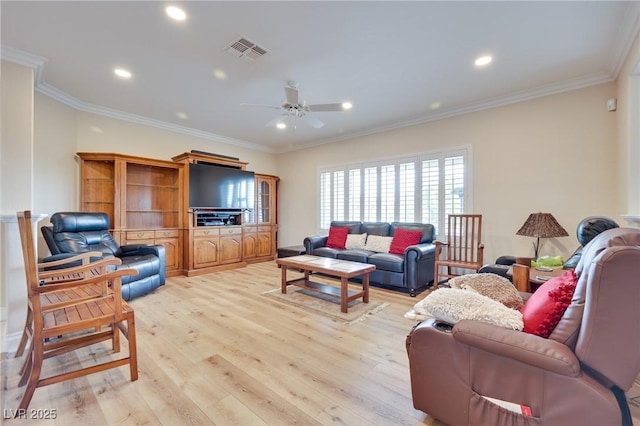 1613 Williamsport St, Henderson, NV 89052 - living area featuring light wood-style floors, a ceiling fan, ornamental molding, and recessed lighting
