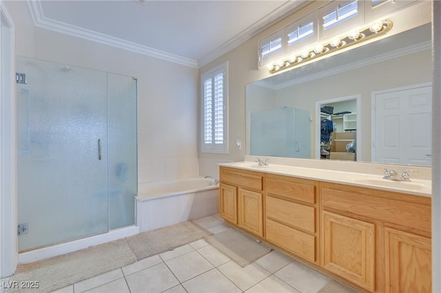 1613 Williamsport St, Henderson, NV 89052 - full bathroom featuring plenty of natural light, a stall shower, a bath, tile patterned flooring, and crown molding