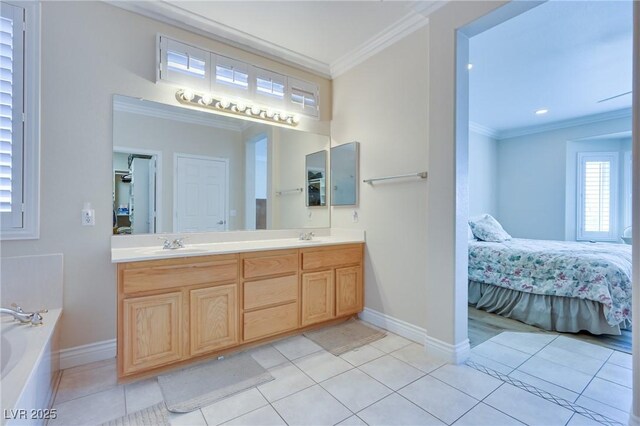 1613 Williamsport St, Henderson, NV 89052 - full bathroom featuring ornamental molding, ensuite bathroom, double vanity, tile patterned floors, and baseboards