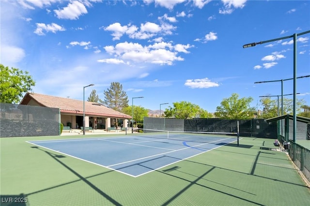 1613 Williamsport St, Henderson, NV 89052 - view of tennis court featuring fence and community basketball court